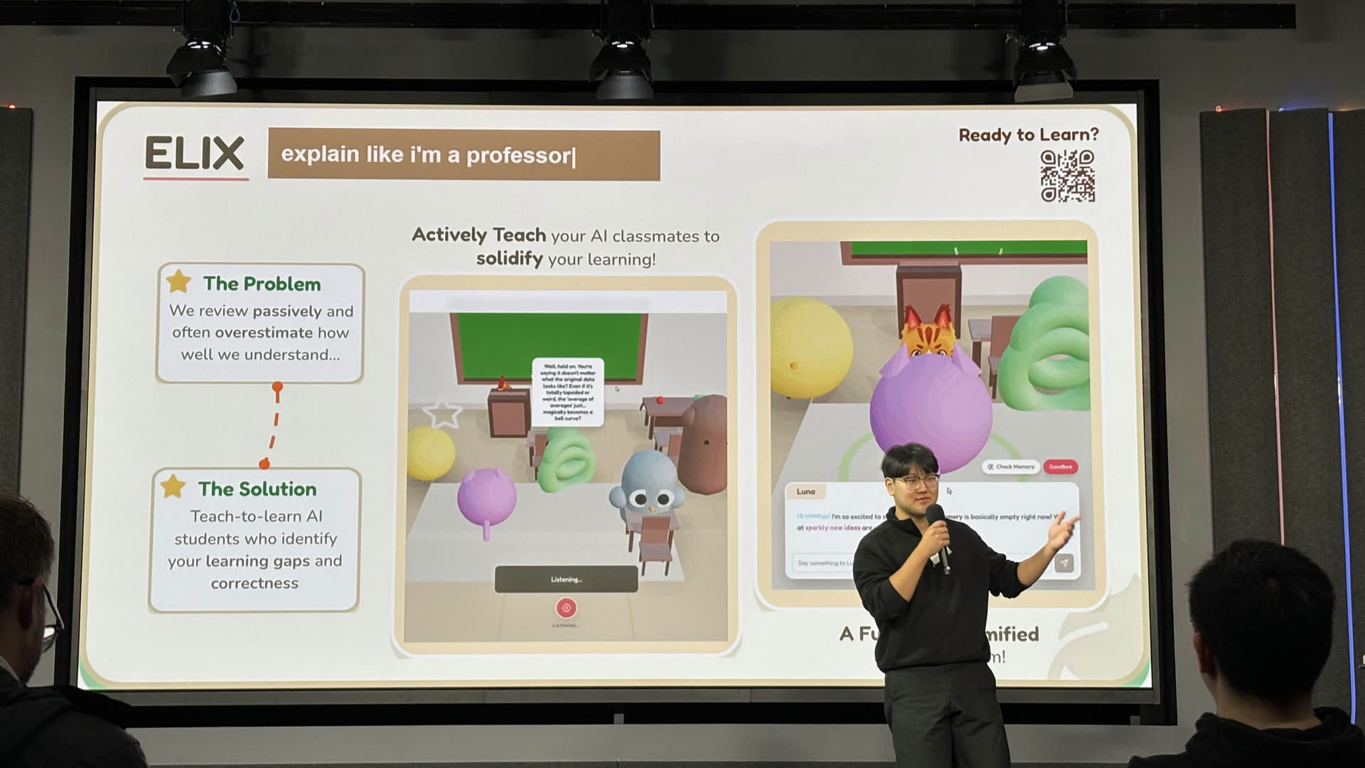 A student presenting the ELIX teach-to-learn prototype to the symposium audience.