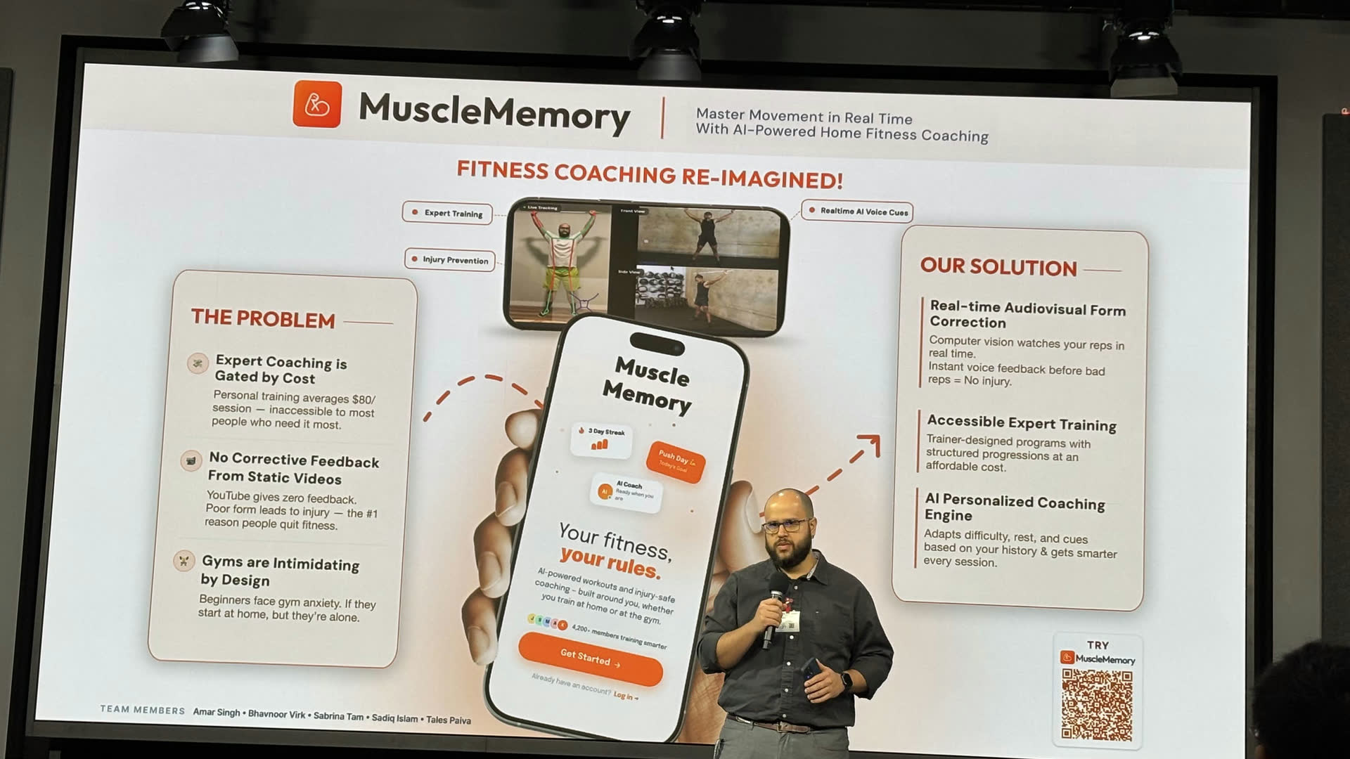 A student presenting the MuscleMemory AI fitness-coaching prototype on stage.